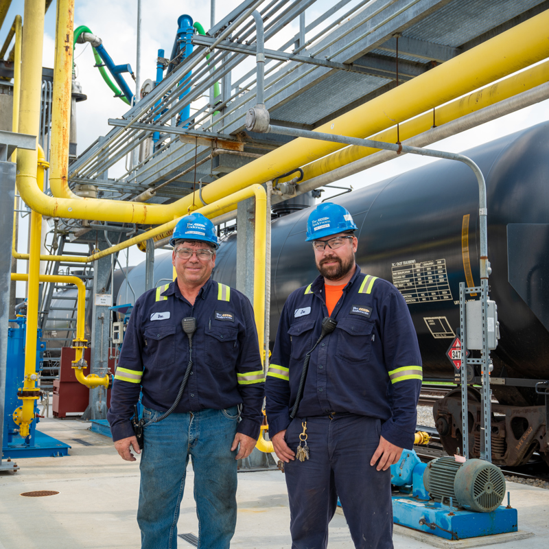 Individuals working at an ethanol plant
