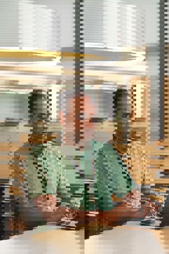 Two individuals from IT working together at The Andersons headquarters